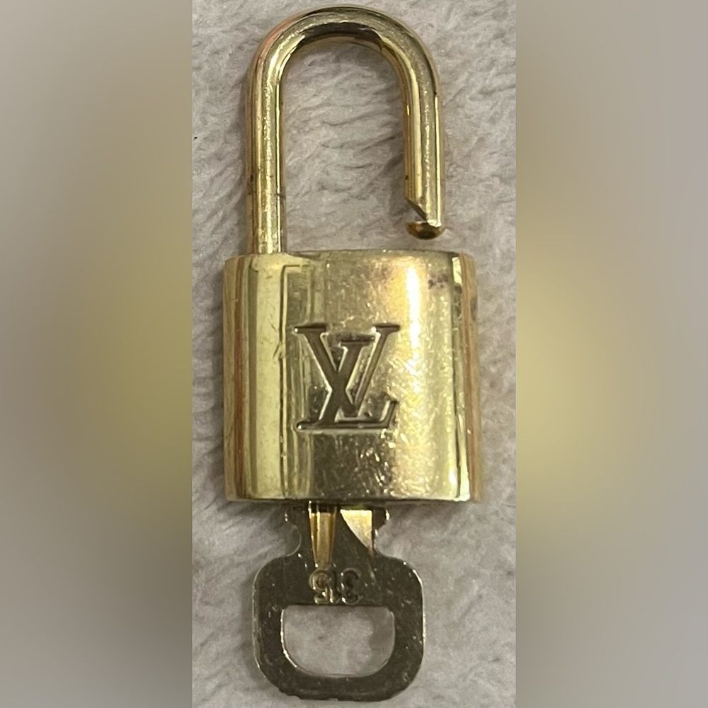 Louis Vuitton padlock and key